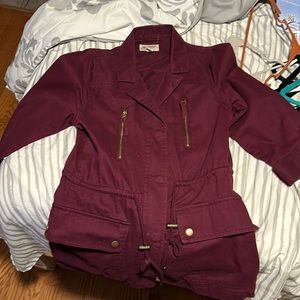 Maroon jacket elbow sleeve